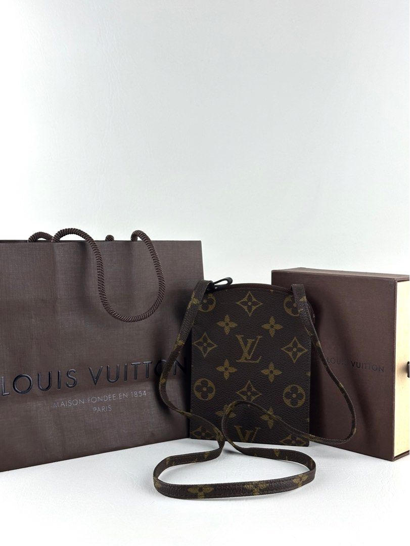 LV Monogram Pochette Secret bag (Category: Luxury Bags & Wallets) located in Manila. Submitted by luvluxe.mnl (Listing ID 1407910793, Image 1). Description: Vintage Piece! Rare find Come with box, paper bag and provided dustbag Excellent to like new condition Mini size— can fit money or passport or vape or cardholder. Price on other reseller online is $521 + Steal item!! Can be shoulder bag, neck bag or crossbody bag .