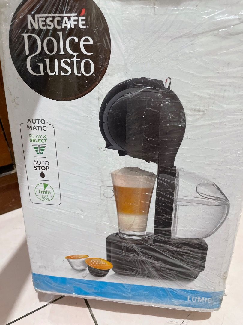NESCAFE Dolce Gusto Lumio Coffee Machine (Category: Coffee Machines & Makers) located in Batangas. Submitted by sopiyaemm (Listing ID 1407818522, Image 1). Description: Selling Nescafe Dolce Gusto Lumio Black (Coffee Machine) ₱6,000 Opened but brand new Pick-up (Malvar, Batangas) Rfs: Got as raffle prize. Has espresso machine so it’s never been used..