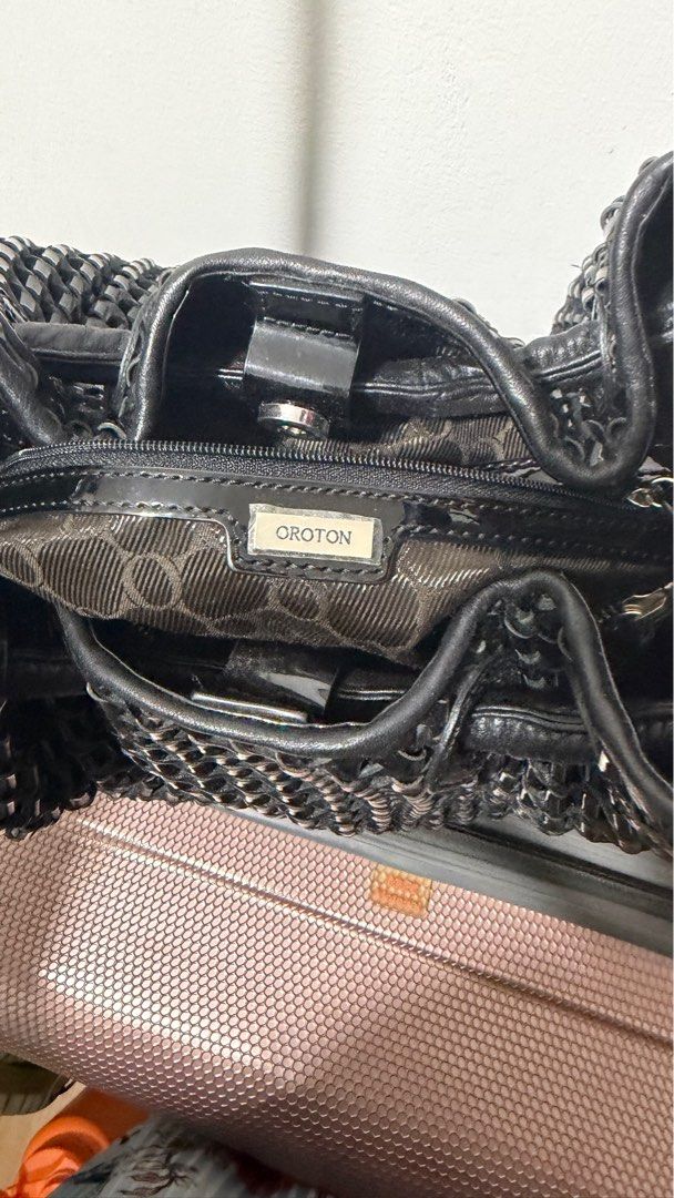 Oroton Black Woven Handbag (Category: Luxury Bags & Wallets) located in Taguig. Submitted by markaisie (Listing ID 1407896858, Image 3). Description: The bag has a woven design and a spacious interior with a zippered 39cm wide and 25cm high. Original Oroton from AU .