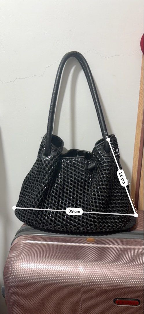 Oroton Black Woven Handbag (Category: Luxury Bags & Wallets) located in Taguig. Submitted by markaisie (Listing ID 1407896858, Image 2). Description: The bag has a woven design and a spacious interior with a zippered 39cm wide and 25cm high. Original Oroton from AU .