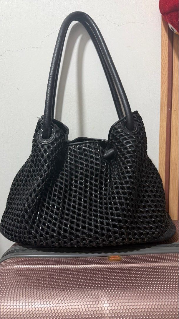 Oroton Black Woven Handbag (Category: Luxury Bags & Wallets) located in Taguig. Submitted by markaisie (Listing ID 1407896858, Image 1). Description: The bag has a woven design and a spacious interior with a zippered 39cm wide and 25cm high. Original Oroton from AU .