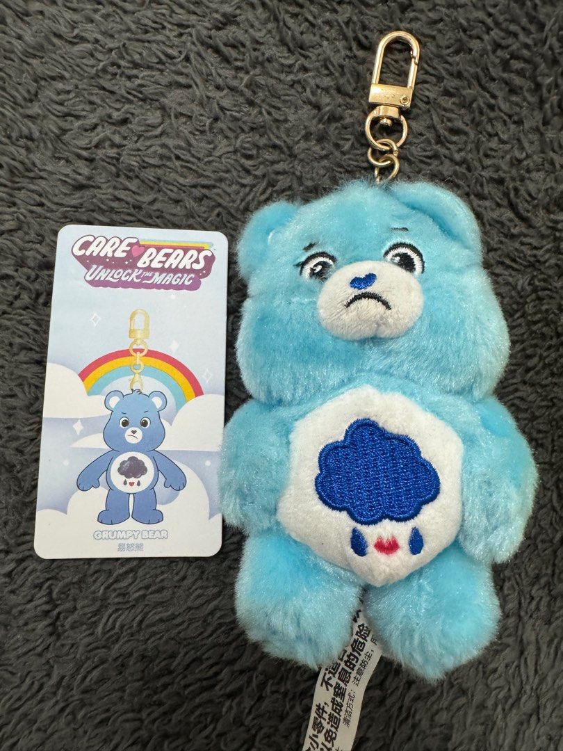 POP MART Care Bears – Unlock the Magic Plush Keychains (Category: Plushies & Soft Toys) located in Pasay City. Submitted by szepter (Listing ID 1407761309, Image 3). Description: POP MART Care Bears – Unlock the Magic Plush Keychains Characters: Grumpy Bear (Blue) & Funshine Bear (Yellow) Condition: Preloved but still in excellent condition coz i unbox and open it. Inclusions: Original POP MART + hard case + character card These are authentic POP