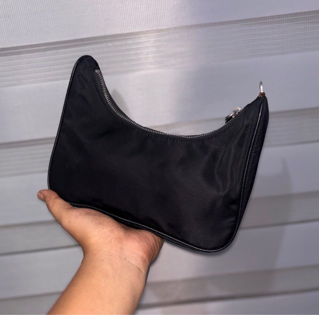 Prada Black Nylon Hobo Bag (Category: Luxury Bags & Wallets) located in Bago City. Submitted by christiaaan0515 (Listing ID 1407804009, Image 2). Description: PRADA KILI BAG AUTHENTIC IN EXCELLENT CONDITION MISSING HANDLE NO OTHER ISSUE .