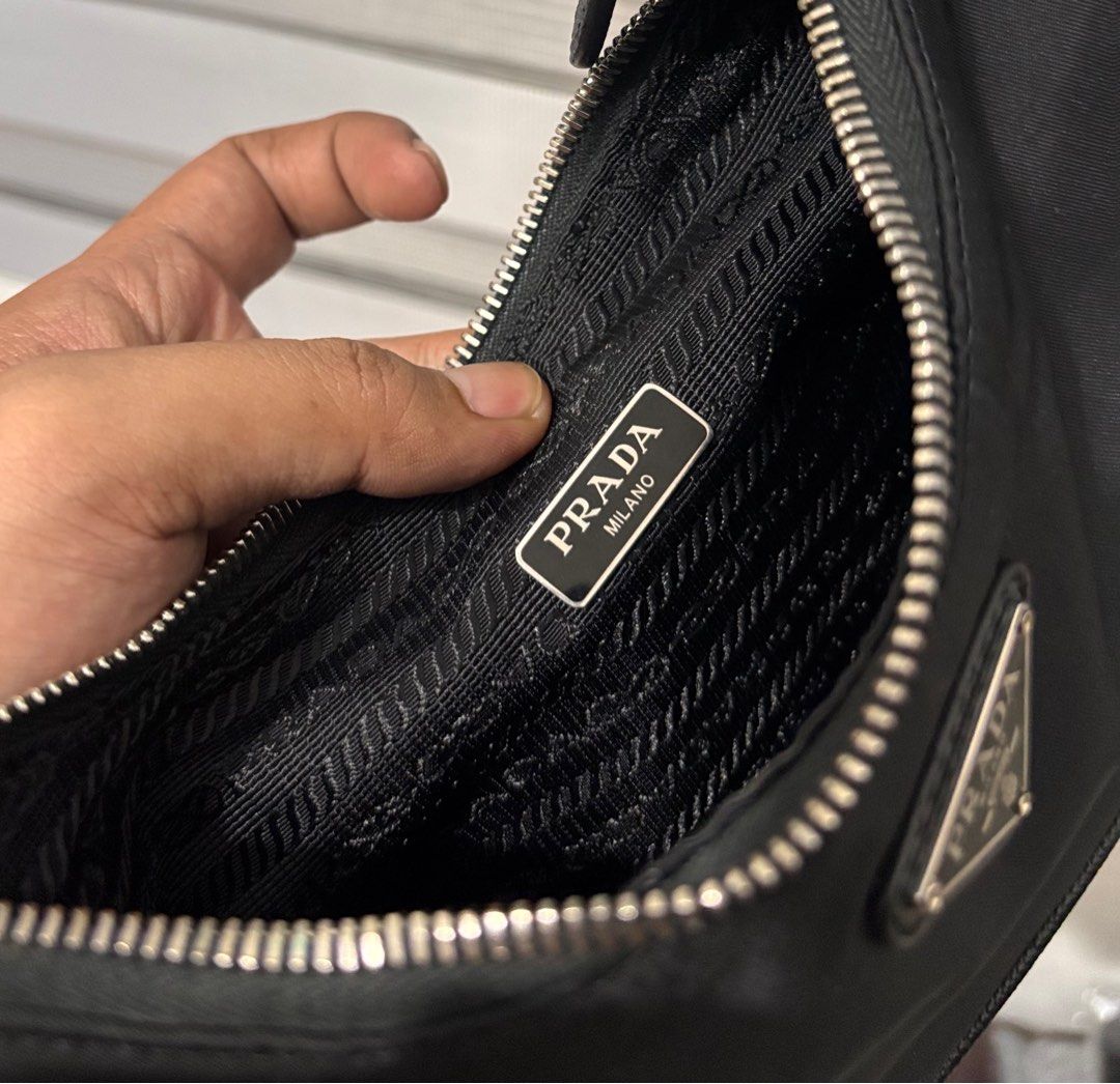 Prada Black Nylon Hobo Bag (Category: Luxury Bags & Wallets) located in Bago City. Submitted by christiaaan0515 (Listing ID 1407804009, Image 3). Description: PRADA KILI BAG AUTHENTIC IN EXCELLENT CONDITION MISSING HANDLE NO OTHER ISSUE .