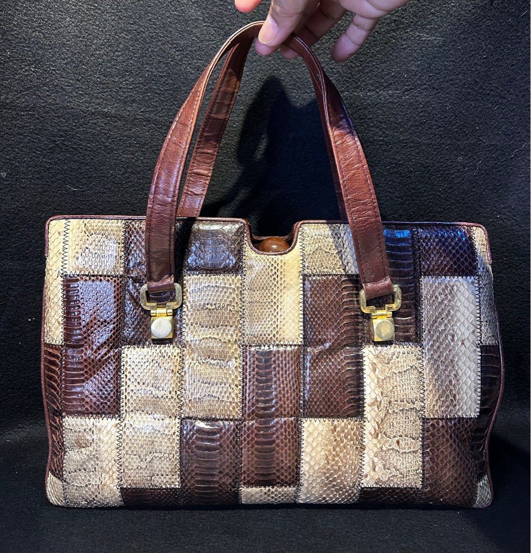 Python 🐍 exotic skin bag. Leather vintage bag (Category: Luxury Bags & Wallets) located in Quezon City. Submitted by WIMC2ndaccount (Listing ID 1407880255, Image 1). Description: 34 X 24 CM Vintage bag Exotic bag Japan bag Good condition Minimal dirt inside its given kase vintage na maganda ang bag .