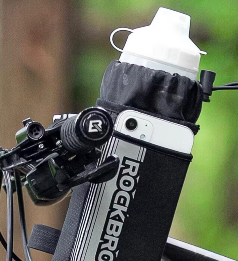 Rockbros Water Bottle Holder (Category: Parts & Accessories) located in Singapore. Submitted by pino_pipito (Listing ID 1407800169, Image 2). Description: Features a drawstring closure and a reflective stripe for added visibility. Perfect for keeping your water bottle secure while cycling or during outdoor activities..
