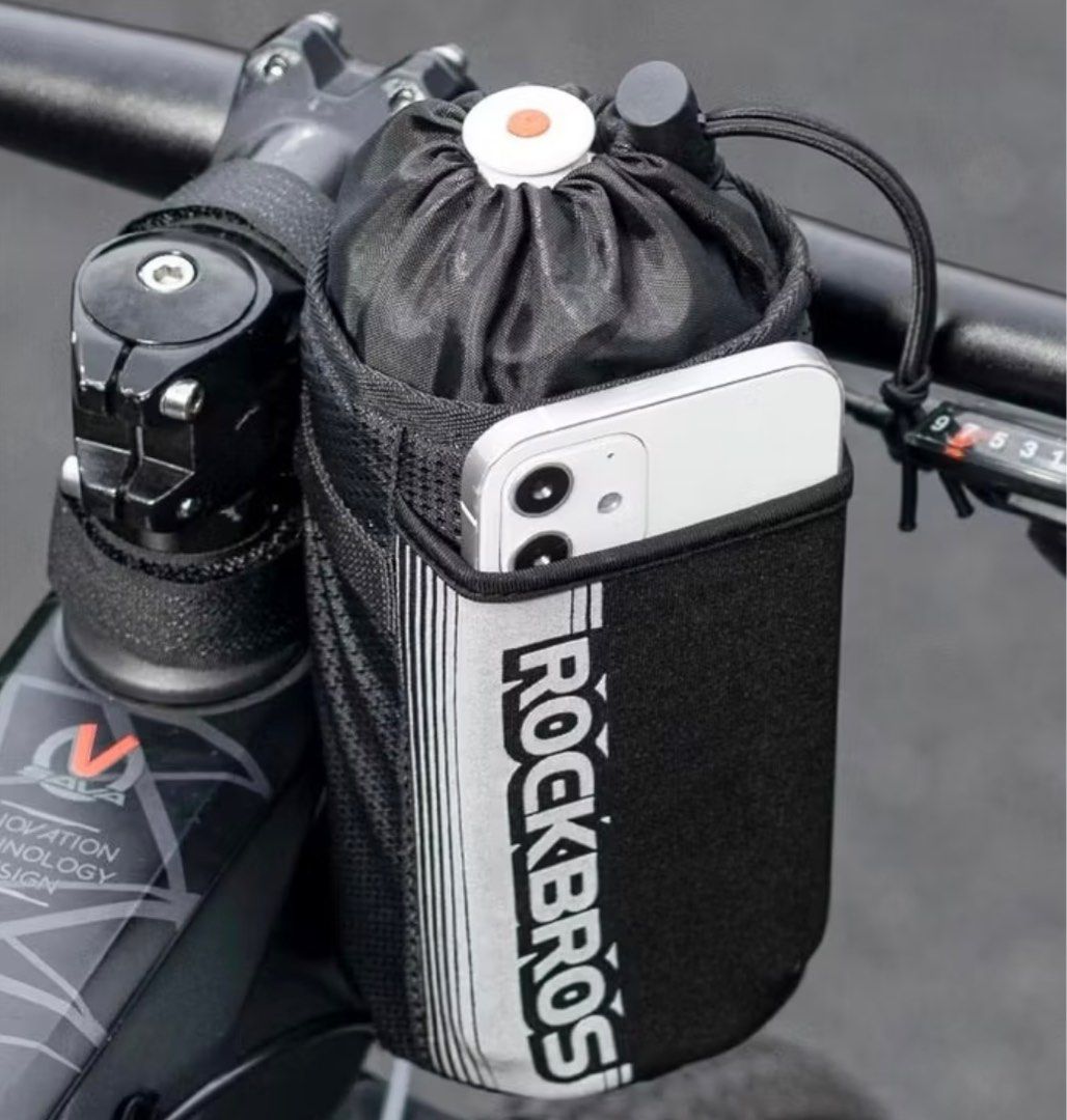 Rockbros Water Bottle Holder (Category: Parts & Accessories) located in Singapore. Submitted by pino_pipito (Listing ID 1407800169, Image 1). Description: Features a drawstring closure and a reflective stripe for added visibility. Perfect for keeping your water bottle secure while cycling or during outdoor activities..