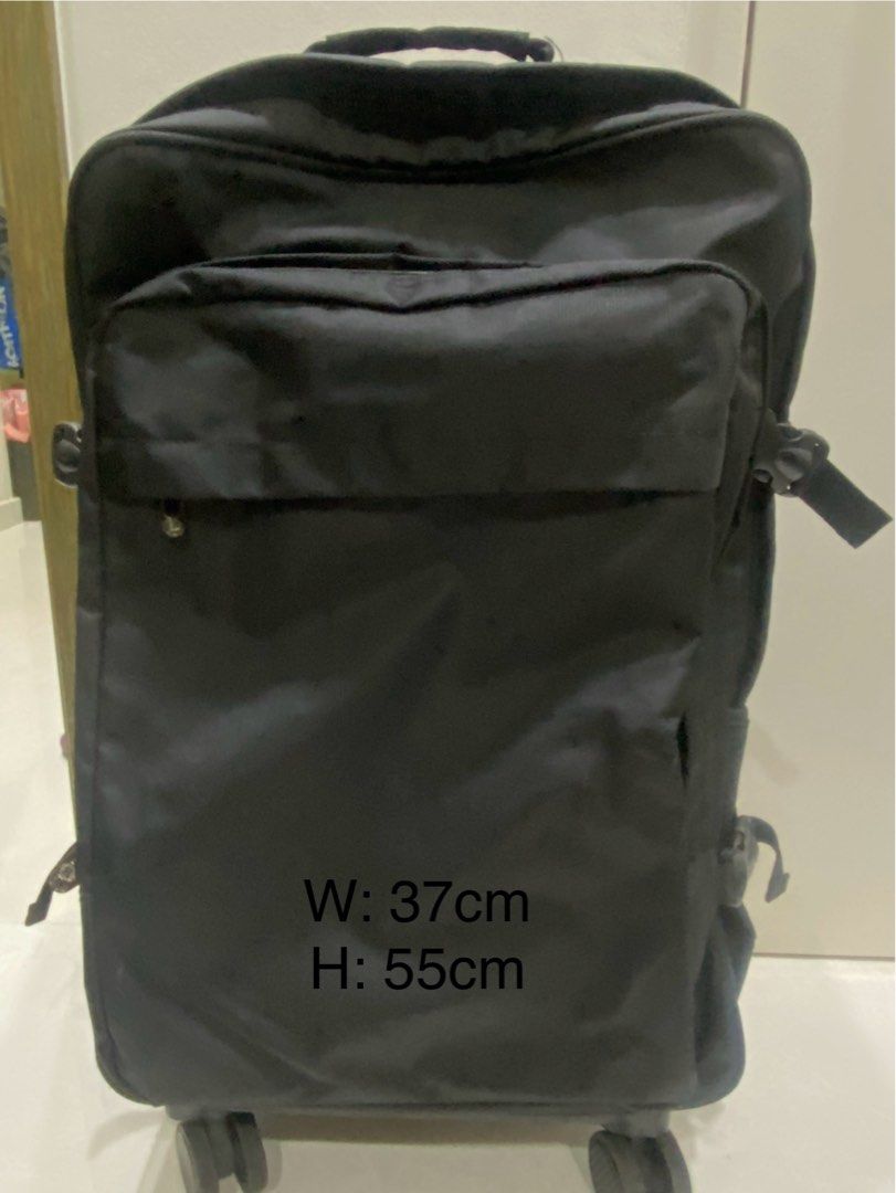Rolling Backpack (Category: Backpacks) located in Singapore. Submitted by bryen292 (Listing ID 1407899444, Image 1). Description: - Plain black design - Rolling backpack with retractable handle and wheels - Adjustable straps for back carrying - Cabin luggage friendly - Selling to declutter - Strictly self collection from Toa Payoh MRT.