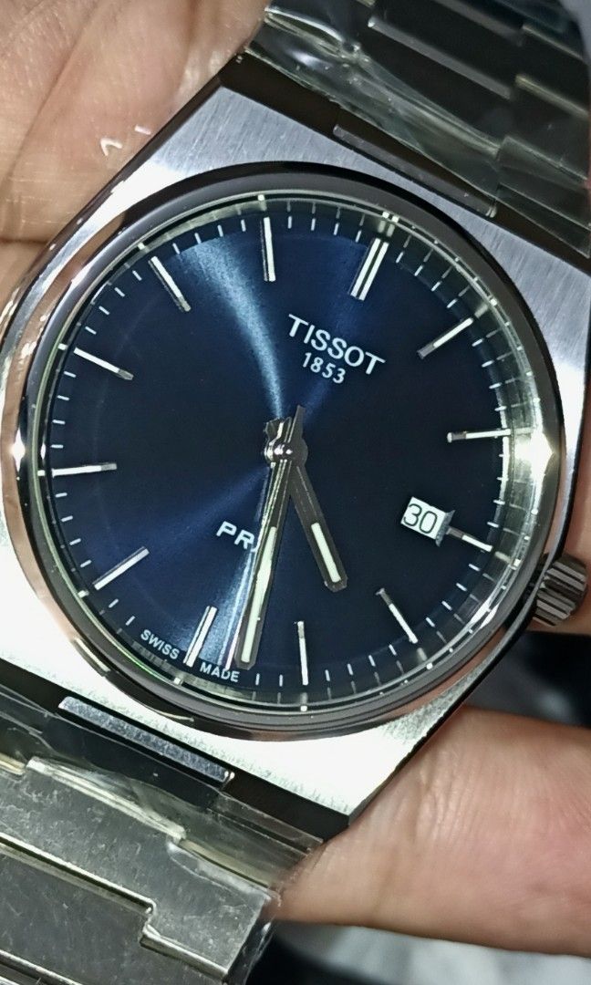 Tissot PRX Blue Dial (Category: Luxury Watches) located in Manila. Submitted by vincenzo_008 (Listing ID 1407882021, Image 1). Description: Tissot PRX 40mm *T137.410.11.041.00 *Diameter:40 mm *316L stainless steel case *Swiss Quartz movement (ETA F06.115 caliber) *Scratch-resistant sapphire crystal *Quick release bracelet .