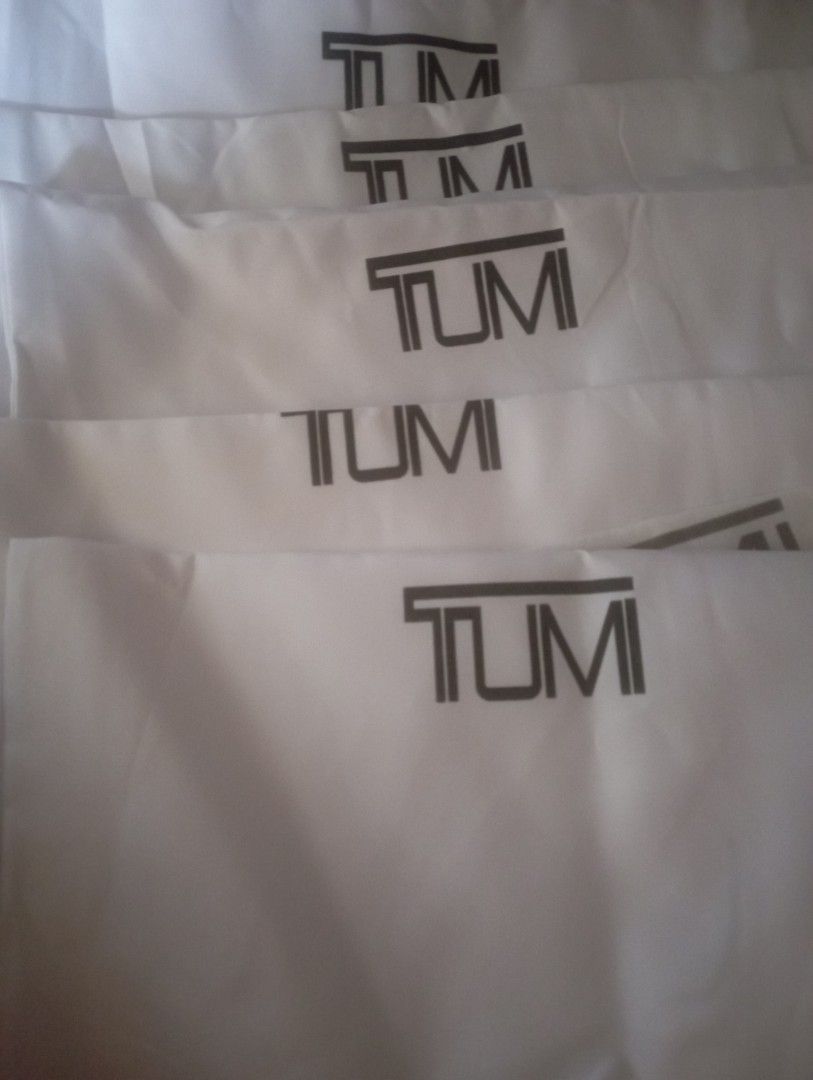 TUMI Dust Bag (Category: Luxury Bags & Wallets) located in Manila. Submitted by ren0997 (Listing ID 1407826705, Image 2). Description: - Genuine TUMI dust bags - White color with TUMI logo - Unused condition - Protects bags from dust and scratches - Perfect for luggage storage - Multiple pieces available.