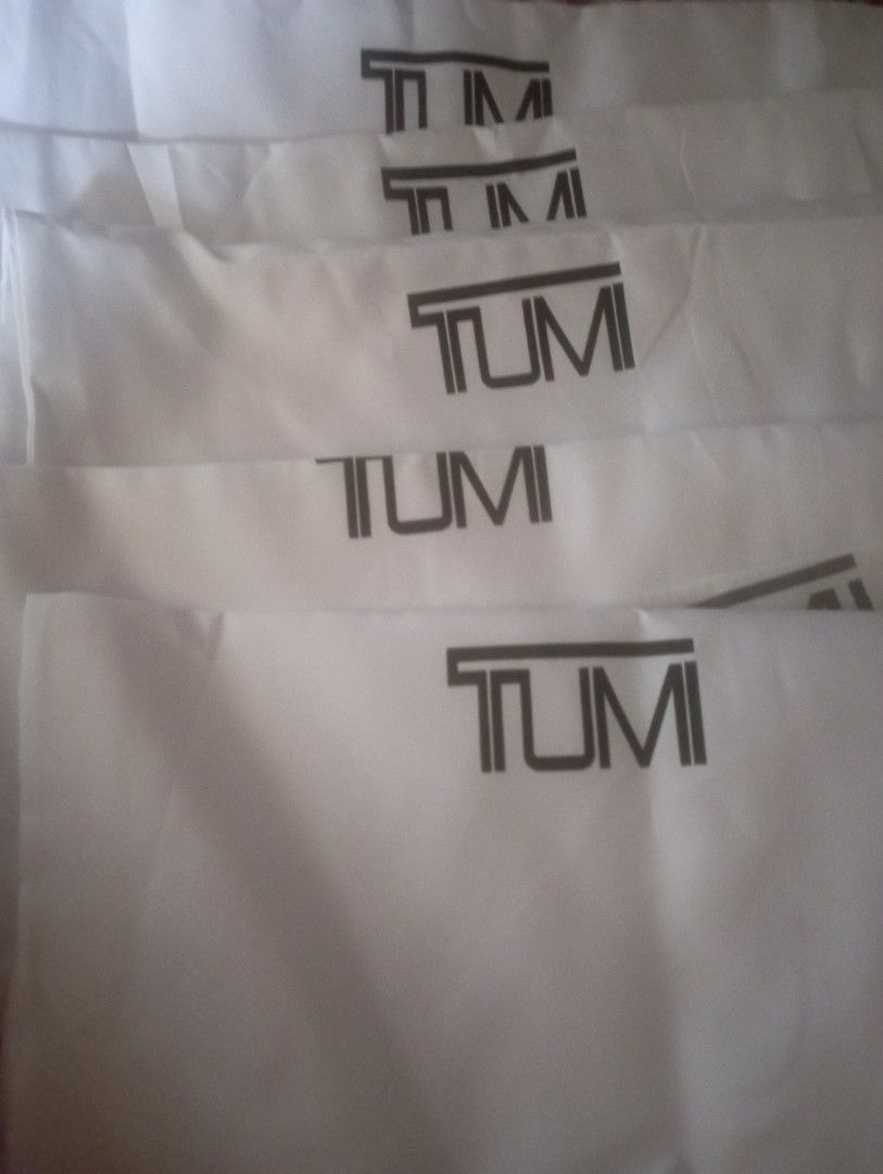 TUMI Dust Bag (Category: Luxury Bags & Wallets) located in Manila. Submitted by ren0997 (Listing ID 1407826705, Image 1). Description: - Genuine TUMI dust bags - White color with TUMI logo - Unused condition - Protects bags from dust and scratches - Perfect for luggage storage - Multiple pieces available.