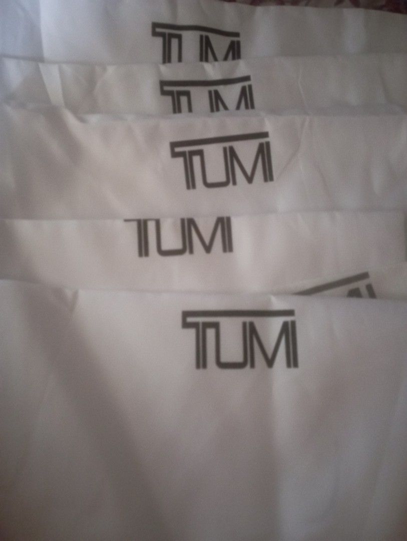 TUMI Dust Bag (Category: Luxury Bags & Wallets) located in Manila. Submitted by ren0997 (Listing ID 1407826705, Image 3). Description: - Genuine TUMI dust bags - White color with TUMI logo - Unused condition - Protects bags from dust and scratches - Perfect for luggage storage - Multiple pieces available.
