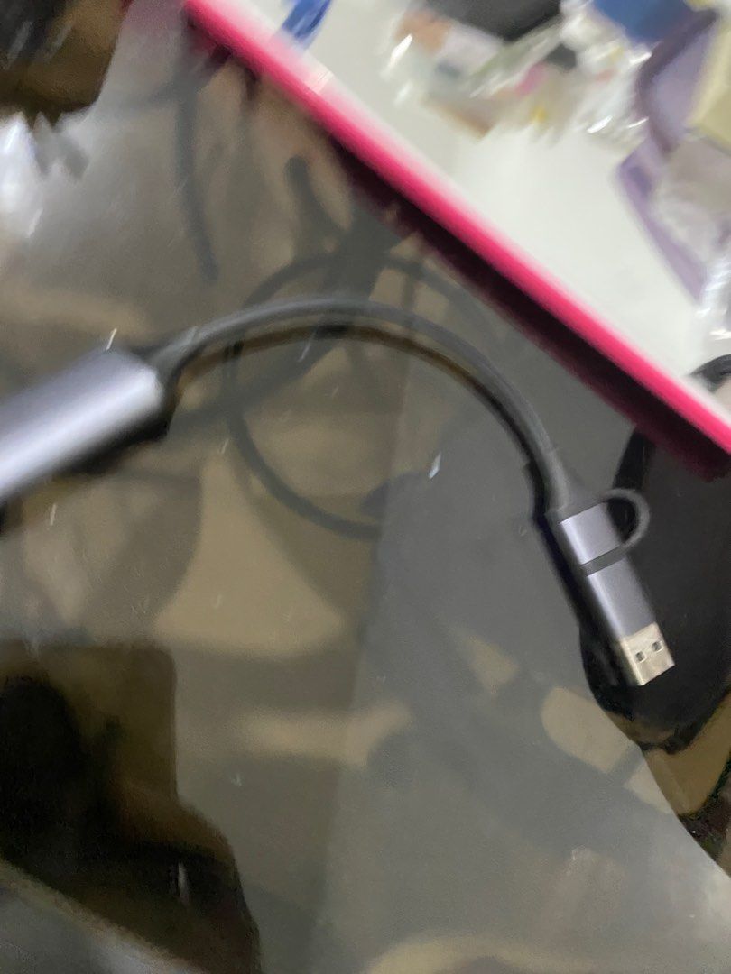 Ugreen USB to HDMI Adapter (Category: Cables & Adaptors) located in Las Pinas. Submitted by trisdanchase (Listing ID 1407870348, Image 3). Description: SELLING FOR 700 RFS: NOT BEING USED ANYMORE QUALITY LIKE NEW - Ugreen USB to HDMI adapter. - Features a USB connector and an HDMI port. - Stylish gray and black color scheme. - Ugreen logo present. - HDMI port with markings. DM FOR QUESTIONS CAN BE USED ON IPAD AND OTHER MONITORS.