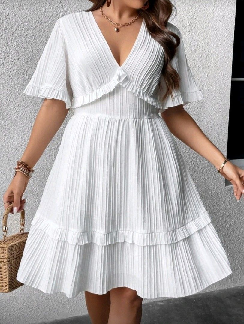 White Pleated Dress with Flutter Sleeves (Category: Dresses) located in Manila. Submitted by elvmoo (Listing ID 1407864776, Image 1). Description: DECLUTTERING‼️ -Shein -XL on tag but could fit L to XXL -Pearl white -Used once for christening -Bought it for 559 pesos 📌 Nangka, Marikina Can do both meetup and delivery. Meet up at Marikina or Arcovia Pasig.