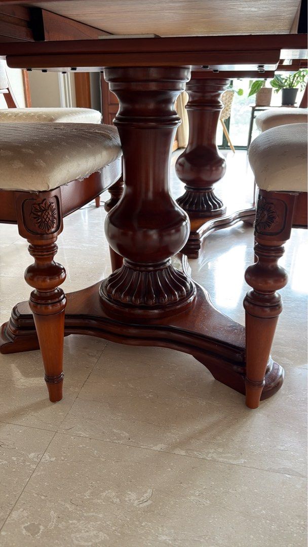 Solid Wood Dining table (Category: Tables & Sets) located in Singapore. Submitted by vd-estate-sale (Listing ID 1407851171, Image 2). Description: Can seat up to 8 pax comfortably Collapsible to six pax dining Custom glass sheet on top for scratch protection .