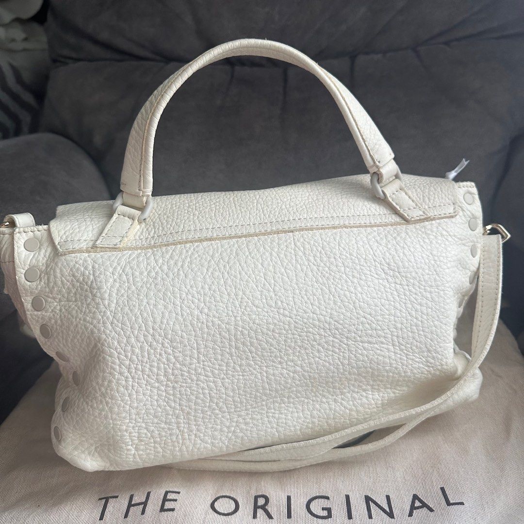 Zanellato Postina Small White (Category: Luxury Bags & Wallets) located in Antipolo. Submitted by fasph (Listing ID 1407757873, Image 3). Description: Brand new wih tags and dustbag Really pretty. Made from real leather. 29 cm wide, 20 cm high, and 15 cm deep, with a handle drop of around 7 cm. Zanellato is an italian luxury brand. This was a gift that I never got to use because I cant maintain a white bag 😅.