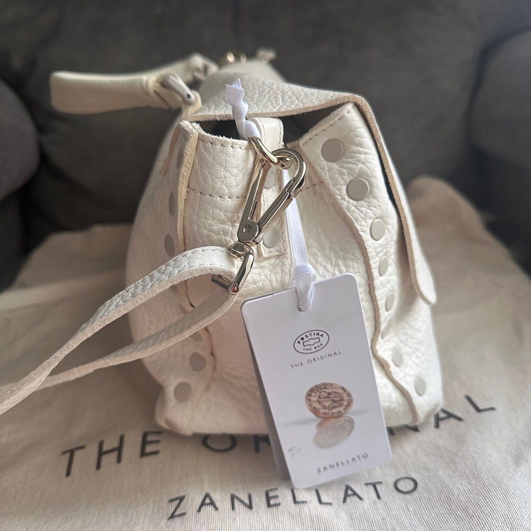 Zanellato Postina Small White (Category: Luxury Bags & Wallets) located in Antipolo. Submitted by fasph (Listing ID 1407757873, Image 2). Description: Brand new wih tags and dustbag Really pretty. Made from real leather. 29 cm wide, 20 cm high, and 15 cm deep, with a handle drop of around 7 cm. Zanellato is an italian luxury brand. This was a gift that I never got to use because I cant maintain a white bag 😅.
