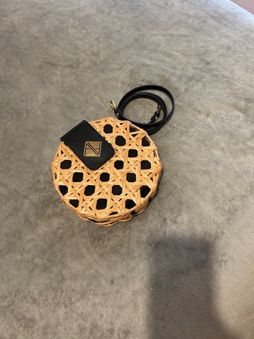 Aranaz Round Woven Handbag with Black Strap (Category: Shoulder Bags) located in Taguig. Submitted by _wardrobecleanse (Listing ID 1408025258, Image 3). Description: Used ONCE only - Round handbag with woven design - Black flap and adjustable strap - Black interior - Magnetic closure - Gold-colored logo - limited so only a few people have it.