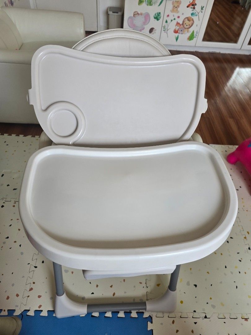 Bollie High Chair with Tray (Category: Baby High Chairs) located in Quezon City. Submitted by bon00 (Listing ID 1407974430, Image 3). Description: Construction: Steel tubing, PP legs and PU leather seat Dimensions: 105cm (h) x 55cm (w) x 75 cm (d Folded dimensions: 80cm (h) x 40cm (d) x 55cm (w - Comfortable padded seat with safety straps - Removable tray for easy cleaning 1. FOLDABLE: -The space-saving high chair frame easily stows away when fol