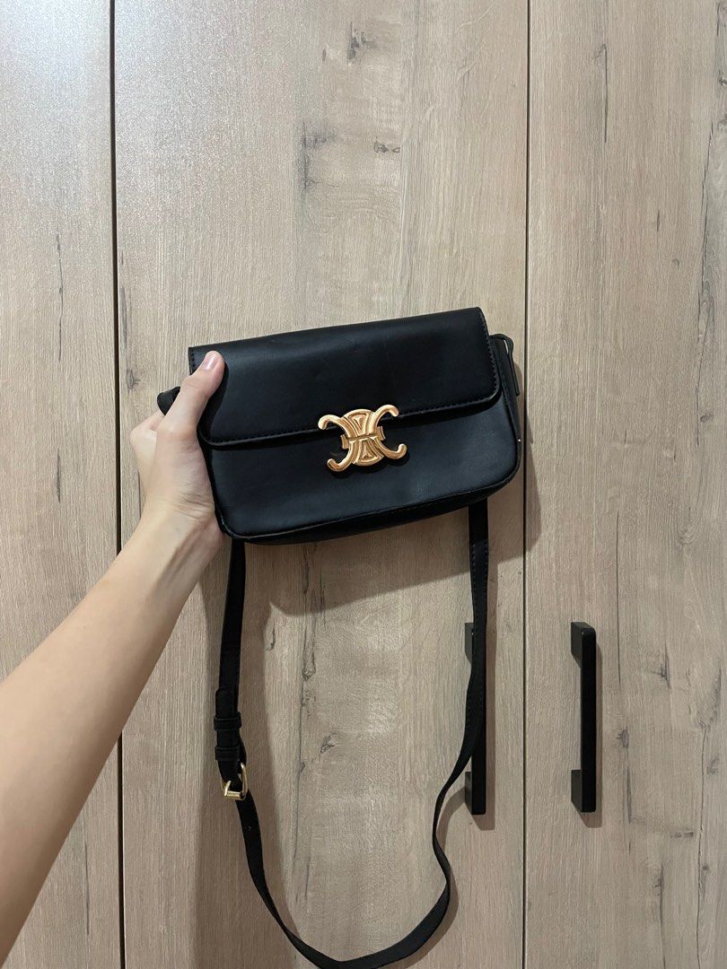 Celine Black Shoulder Bag (Category: Luxury Bags & Wallets) located in Naga. Submitted by robin___ (Listing ID 1408062735, Image 1). Description: - Black shoulder bag - Gold-colored clasp - Adjustable long strap - Flap closure - Made of leather or similar material.