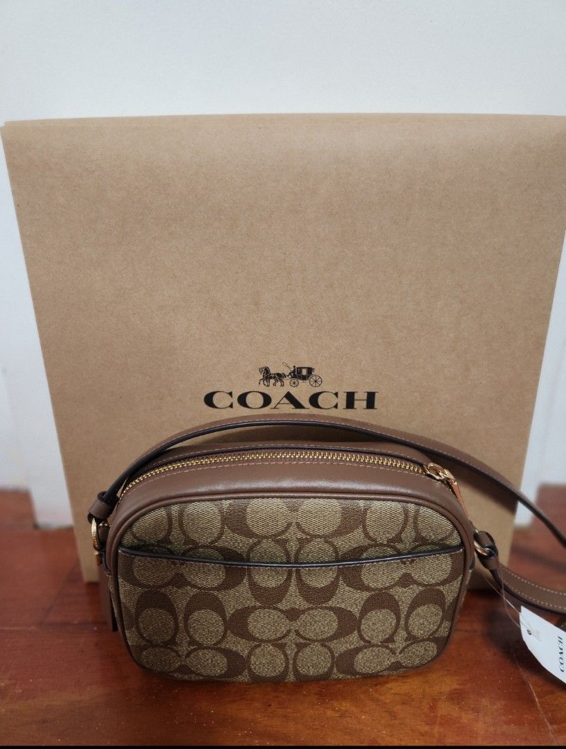 Coach - Mini Jaime Camera Bag ( Brown) (Category: Luxury Bags & Wallets) located in Paranaque City. Submitted by imcatortigas (Listing ID 1407945276, Image 2). Description: Coach - Mini Jamie Camera Bag (Black) Dimensions: 8x5.75x2.5 in Has outside pocket, inside pocket, 2 cc slots Brand New Original.
