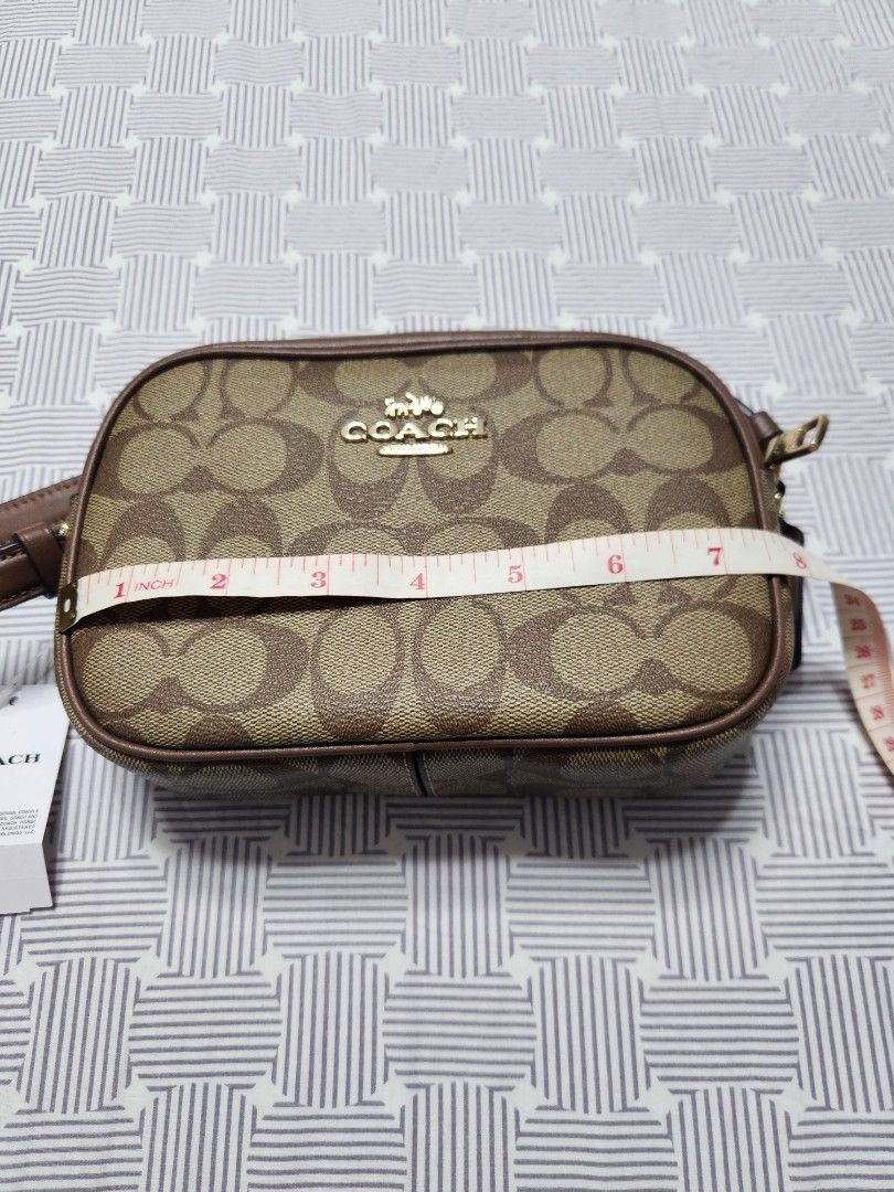 Coach - Mini Jaime Camera Bag ( Brown) (Category: Luxury Bags & Wallets) located in Paranaque City. Submitted by imcatortigas (Listing ID 1407945276, Image 3). Description: Coach - Mini Jamie Camera Bag (Black) Dimensions: 8x5.75x2.5 in Has outside pocket, inside pocket, 2 cc slots Brand New Original.