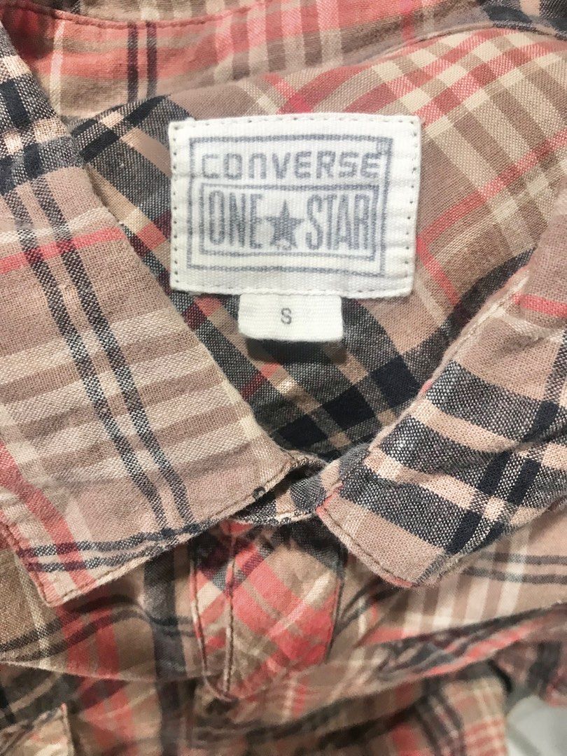 Converse Plaid Long Sleeve Shirt (preloved) (Category: Tshirts & Polo Shirts ) located in Siniloan. Submitted by cleo_fas (Listing ID 1407946444, Image 3). Description: - Converse - Long-sleeved plaid shirt - Colors: Red, brown, and navy - Features: Button-down front, two chest pockets - Material: Soft, possibly flannel - Collar: Standard - Cuffs: Buttoned - Style: Casual - Size S-M.