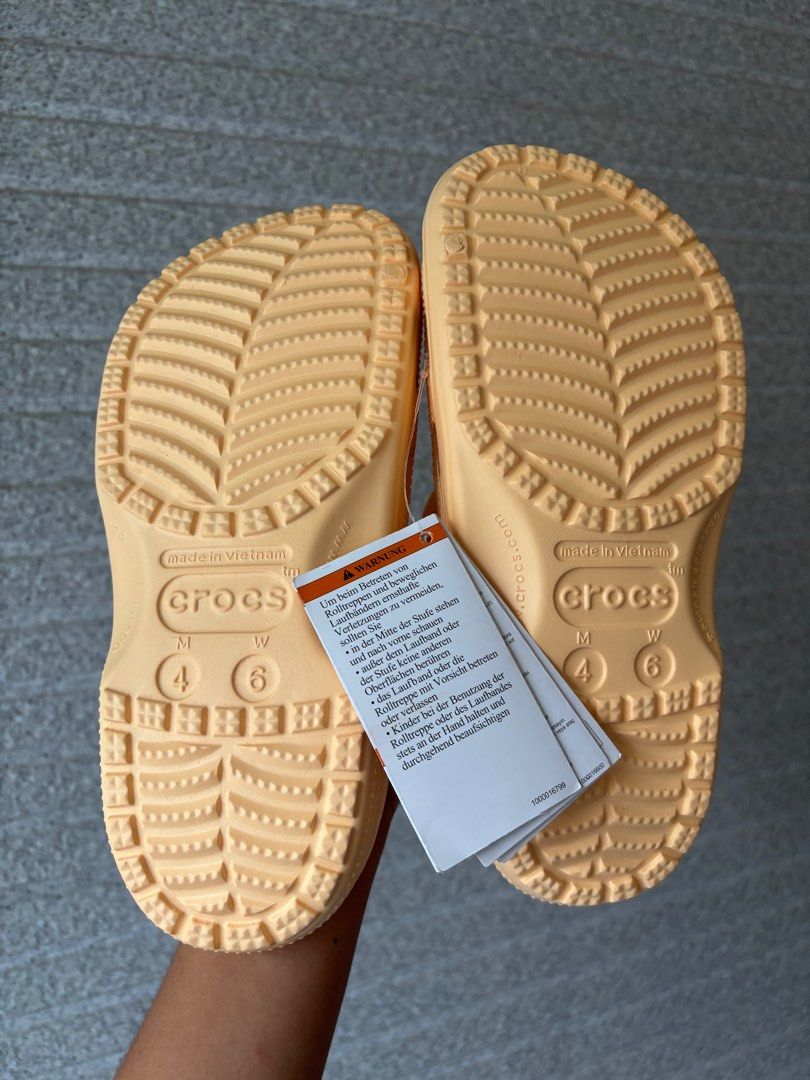 Crocs Classic Clog in Golden Hour (Category: Slippers and slides) located in Tacloban City. Submitted by ceegieca (Listing ID 1407982305, Image 2). Description: M4W6 With ecobag.