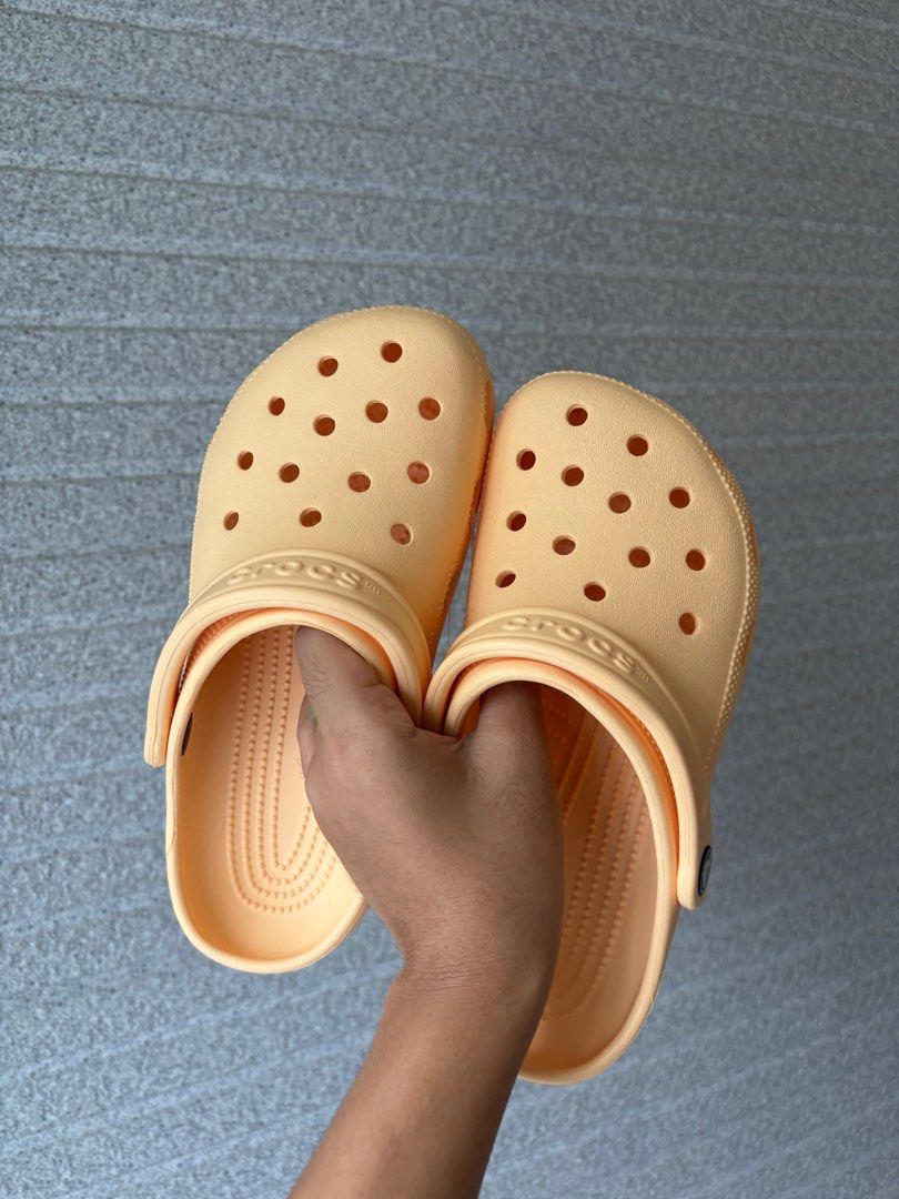 Crocs Classic Clog in Golden Hour (Category: Slippers and slides) located in Tacloban City. Submitted by ceegieca (Listing ID 1407982305, Image 1). Description: M4W6 With ecobag.