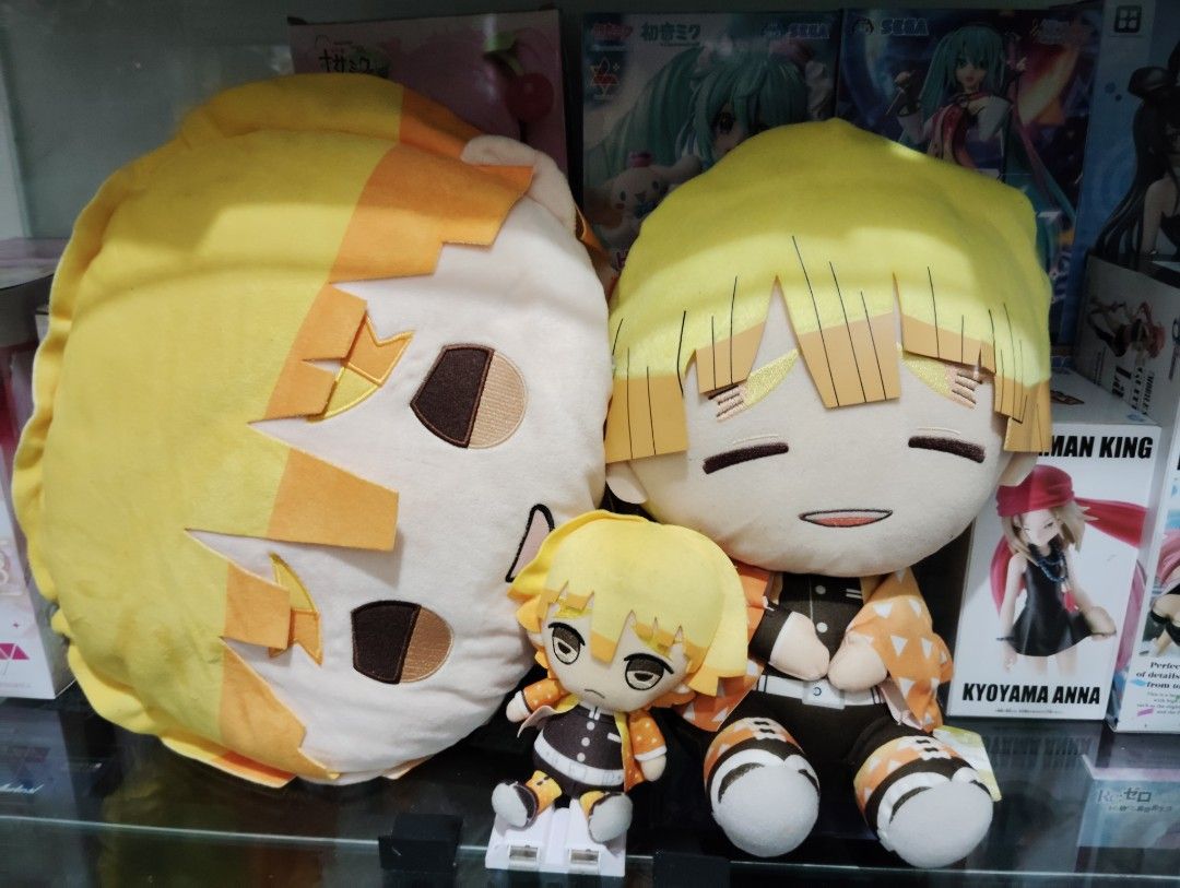 Demon Slayer Zenitsu Plush Pillow and Figures (Category: Plushies & Soft Toys) located in Quezon City. Submitted by chichiwaa (Listing ID 1407943874, Image 1). Description: - Zenitsu Agatsuma Collection! - Includes: - Large plush pillow - Medium plush - Small figure - Features Zenitsu's iconic yellow hair and outfit..