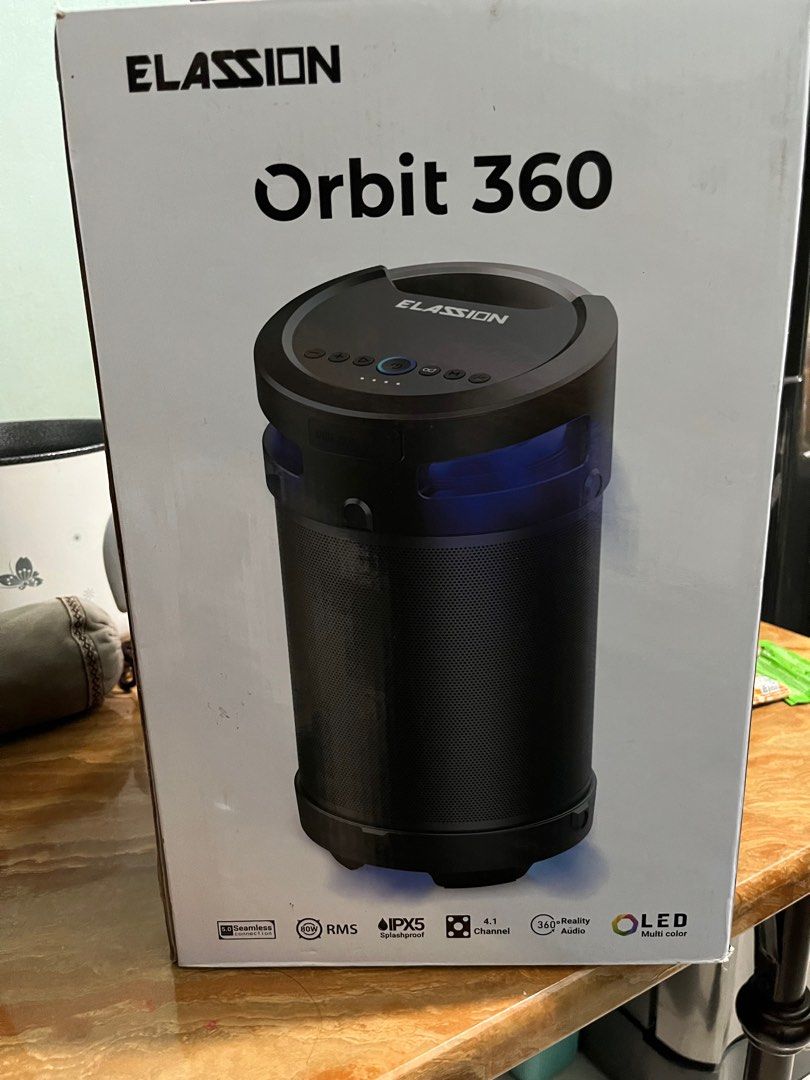 Elassion Orbit 360 Bluetooth Speaker (Category: Soundbars, Speakers & Amplifiers) located in Caloocan City. Submitted by zheligin0932803 (Listing ID 1407956730, Image 2). Description: Brand New Elassion Bluetooth speaker 4.1CH Portable Bluetooth Waterproof Speaker, delivers monstrous sound with the hardest hitting bass. • True 4.1CH sound • Multicolor LED light • IPX5 Splashproof • Bluetooth 5.0 version.