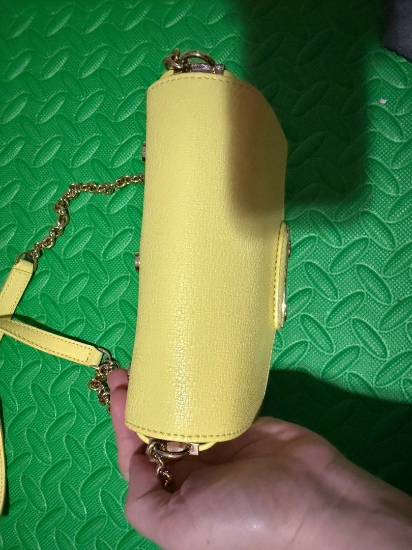 Furla Metropolis Mini Crossbody Bag (Category: Luxury Bags & Wallets) located in Cavite. Submitted by tripleKgels (Listing ID 1408032265, Image 3). Description: Like new Grained Leather Minor scratches in the hardware with dustbag and cards.