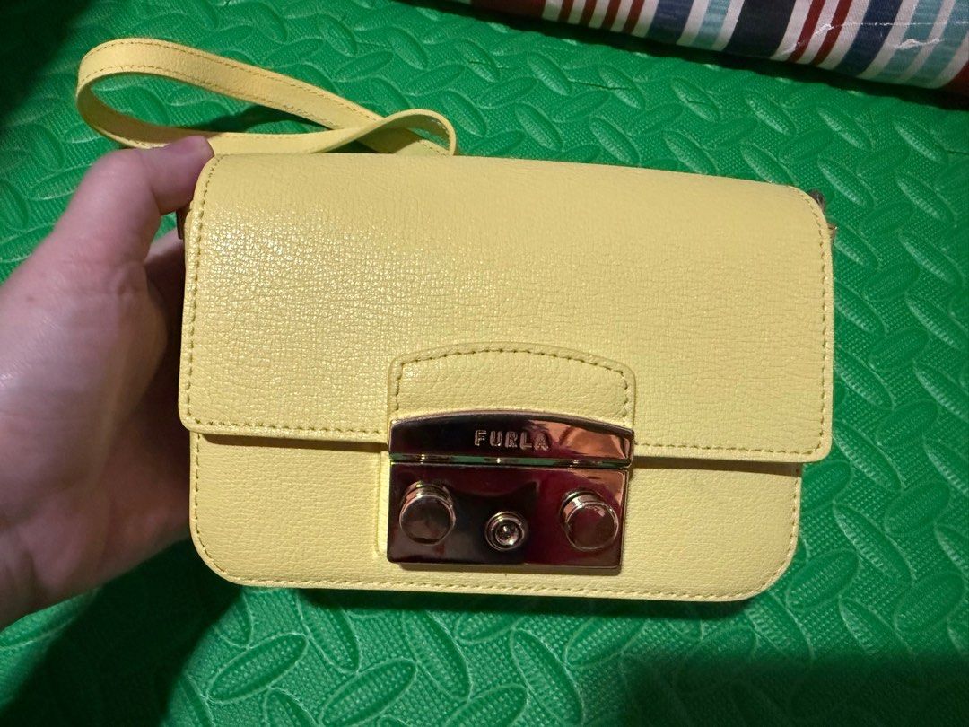 Furla Metropolis Mini Crossbody Bag (Category: Luxury Bags & Wallets) located in Cavite. Submitted by tripleKgels (Listing ID 1408032265, Image 2). Description: Like new Grained Leather Minor scratches in the hardware with dustbag and cards.