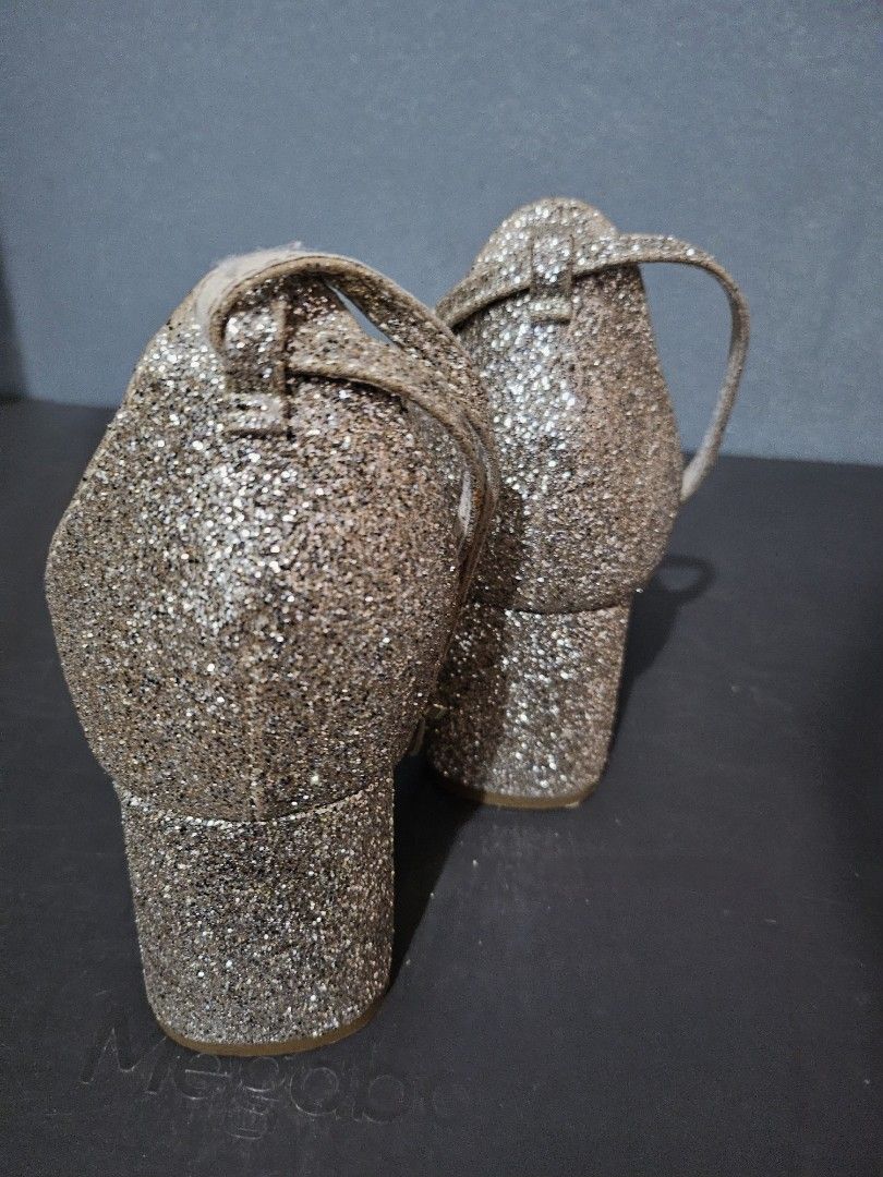 B2T1 Glittery Block Heel Sandals size 11 (Category: Heels) located in Angeles City. Submitted by buxom.cheeks (Listing ID 1408017104, Image 3). Description: - Glitter block heel sandals - Ankle strap design - Single toe strap - Neutral color (gold/silver) - Signs of wear on insole - Glitter-covered heels.