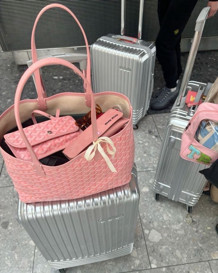 Goyard Pink Tote Bag (Category: Luxury Bags & Wallets) located in Davao. Submitted by yournewbabieszx (Listing ID 1408055685, Image 2). Description: - du/p3 Pink Goyard Tote Bag - Includes matching pouch - Features the signature Goyard geometric pattern - Spacious interior for all your essentials - Comfortable double handles for carrying.