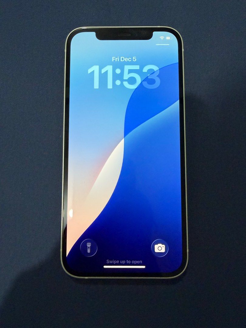 Iphone 12 64GB (Category: iPhone 12 Series) located in Caloocan City. Submitted by jdeocera (Listing ID 1407968492, Image 2). Description: FOR SALE: Iphone 12 64GB White Software updated to ios 26.1 Good condition (no major scratches. no defects) All working (Face ID, PIN, Speakers, Volume, Cameras, etc.) Battery: 72% Slightly negotiable Open to All Networks Meet-ups only: Weekdays (UP Technohub) Weekends: South Caloocan area or nearby.