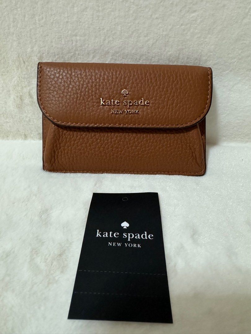 Kate Spade Dumpling Small Flap Card Holder (Category: Luxury Bags & Wallets) located in Manila. Submitted by eloisagvilale (Listing ID 1408074534, Image 2). Description: Kate Spade Dumpling Small Flap Card Holder.