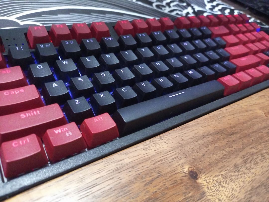 KEYCAPS ONLY black and red 103 keys keyboard keycaps (Category: Computer Keyboard) located in Quezon City. Submitted by vinzrandompick (Listing ID 1407959318, Image 1). Description: - important: KEY CAPS ONLY - hindi ginamit - yung mga parang gasgas, sa print yata mismo - smooth kasi, parang hindi outer damage - 103 keys (kakabilang ko lang ulit as of December 05, 2025) - OEM layout? basta yung mataas - backlit kaya pwede sa madilim - used rakk i