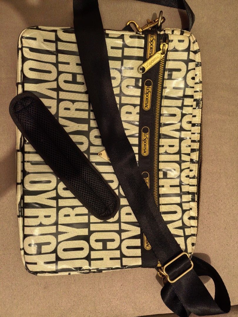 LeSportsac Joyrich Laptop Bag (Category: Laptop Bags & Sleeves) located in Quezon City. Submitted by traroro (Listing ID 1408107798, Image 1). Description: - LeSportsac laptop bag - Unique Joyrich print - Black adjustable shoulder strap with shoulder pad - Gold zipper - LeSportsac branded zipper pull - can fit Lenovo ThinkPad T15.