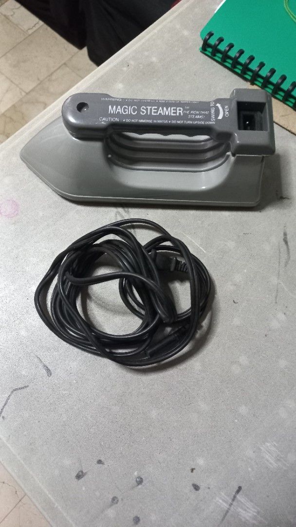 Magic Steamer Clothes Steamer (Category: Irons & Steamers) located in Quezon City. Submitted by msdcshop (Listing ID 1407984810, Image 2). Description: Emson made in china decluttering hindi na ginagamit comes in handy pag nagmamadali .