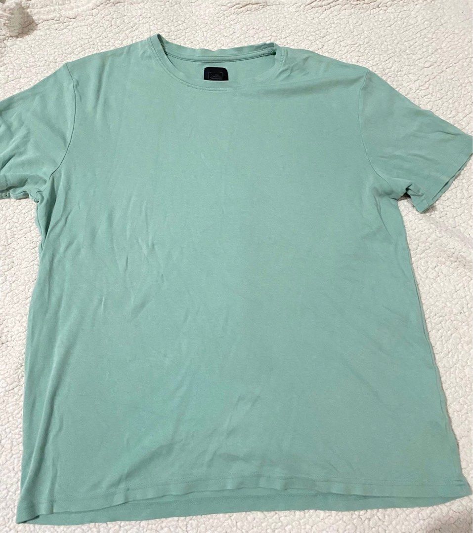 Men’s shirt (Category: Tshirts & Polo Shirts ) located in Minalin. Submitted by declutter_ry (Listing ID 1408006547, Image 3). Description: - Men's shirts for sale -Price range: ₱150-200 price negotiable -Can give discounts if you get 2 or more items - Brands: Nike, 14th & Union, Banana Republic, Penguin, Calvin Klein - Colors: Orange, Mint Green, Striped, and more - Designs: Graphic tees, striped shirts, button-down - Sizes: Mostly Medium - Cond