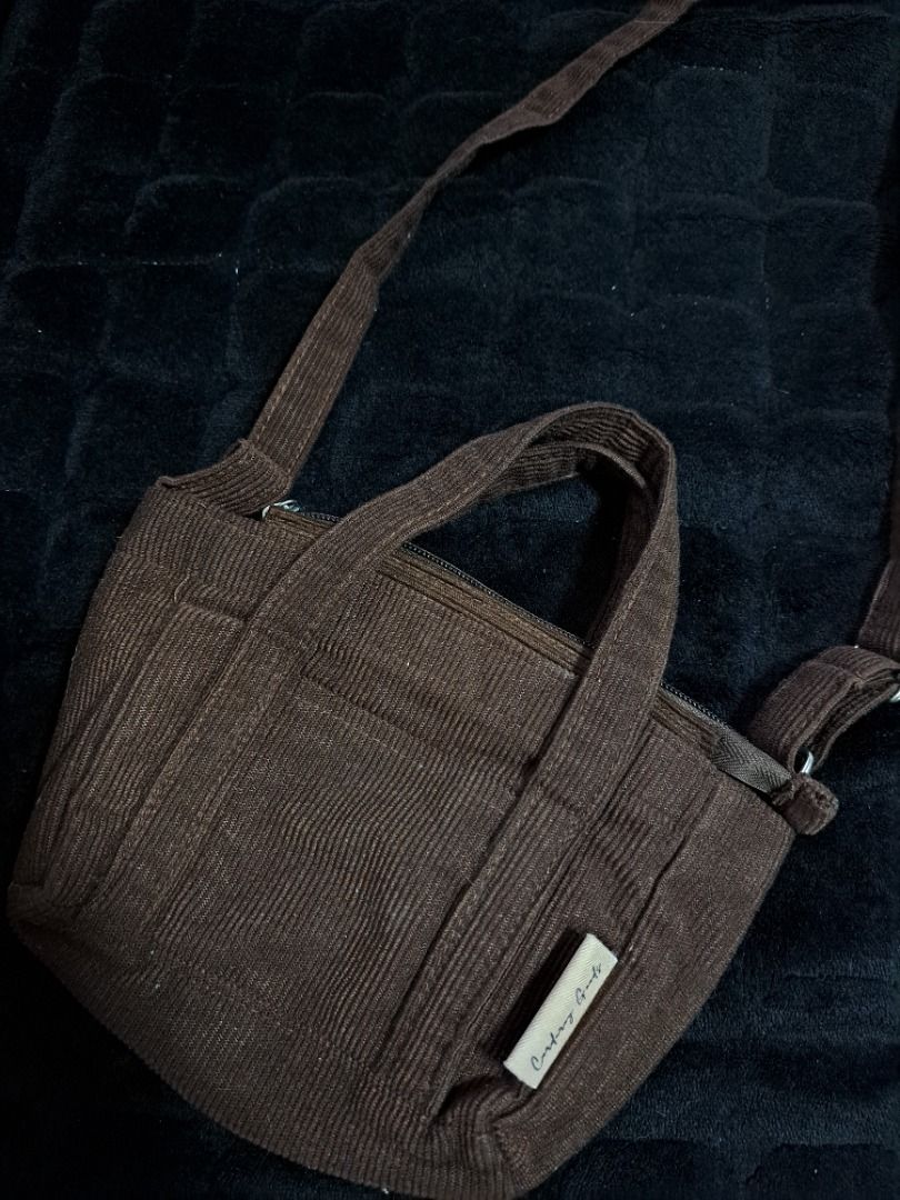 Micro Corduroy sling bag by corduRY. (Category: Cross-body Bags) located in Tarlac. Submitted by allisonaton (Listing ID 1408012348, Image 2). Description: Chocolate brown Corduroy body bag Like new condition Rfs: decluttering😊 MOP: Gcash .