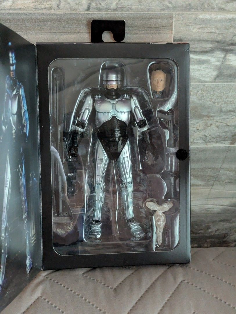 NECA Ultimate RoboCop (Category: Figurines & Statues) located in Manila. Submitted by dorkystuff (Listing ID 1408024603, Image 3). Description: BRAND NEW AND SEALED NECA ULTIMATE ROBOCOP 7 inch scale premium action figure.