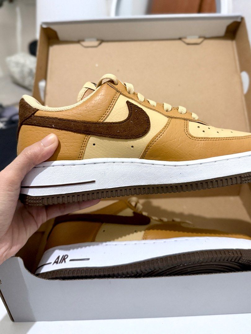 Nike Air Force 1 '07 Next Nature (Category: Sneakers) located in Cavite. Submitted by ericawithg (Listing ID 1408034210, Image 2). Description: - Nike Air Force 1 '07 Next Nature - Tan and brown colorway - Size 7.5 (EUR 8.5) - White midsole, brown outsole - Nike Air logo on tongue and heel - Floral design insole -10/10 -Used twice only -RFS: Got more pairs + decluttering -Orig price is already posted! Pls no haggling. .