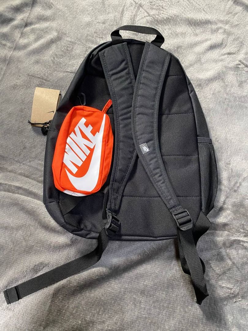 Brand New Nike Black Backpack 20L (Category: Backpacks) located in Valenzuela. Submitted by emg.everythingmustgo (Listing ID 1408077097, Image 2). Description: - Nike Black Backpack, 20L capacity. - Features the iconic Nike logo. - Classic black color for versatile use. - Includes a bonus orange pouch. - Side pocket for water bottle. Original SRP 1,695.