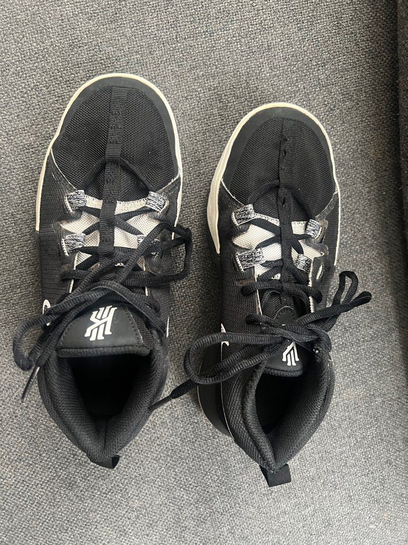 Nike Kyrie Flytrap 4 Basketball Shoes (Category: Sneakers) located in Quezon City. Submitted by authenticcloset (Listing ID 1407996670, Image 3). Description: - Nike Kyrie Flytrap 4 - Black and white colorway - Features Kyrie logo - Size: US 4.5Y - Condition: still in very good condition except may part na nagyellow on soles pls check photos bottom part malinis pa po halos hindi nagamit no holes no chips Outersole: 27cm Used only during my sons b