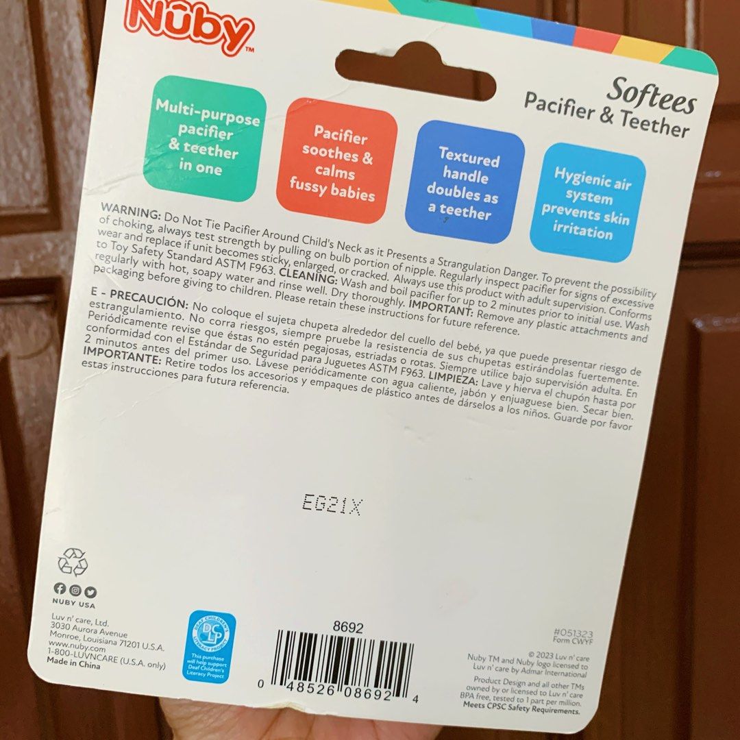 Nuby Softees Pacifier & Teether (Category: Soothers & Pacifiers) located in Manila. Submitted by ishymnl (Listing ID 1407976596, Image 2). Description: Yung peach color lang ang nagamit (once), the rest never nagamit Bought in US 100% Authentic RFS: Decluttering.