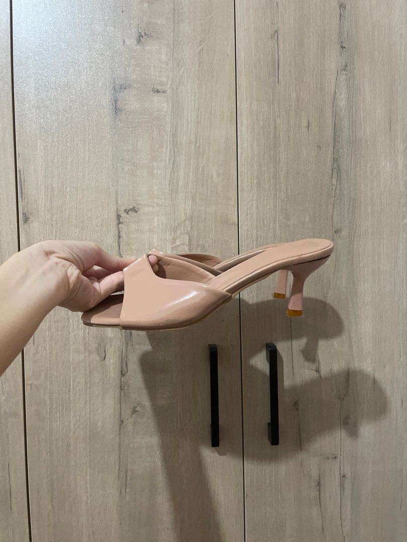 Nude Heeled Sandals (Category: Heels) located in Naga. Submitted by robin___ (Listing ID 1408064267, Image 1). Description: - Nude sandals - Small heel (light pink) - Slip-on style - Single strap - Adds sophistication to any outfit.