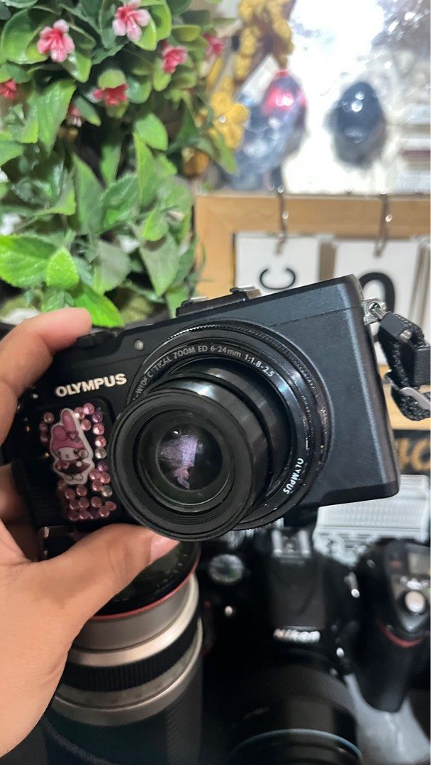 Olympus Stylus XZ-2 Digital Camera (Category: Cameras) located in Manila. Submitted by mysticfox-2237 (Listing ID 1407947160, Image 2). Description: Olympus stylus xz-2 good condition fully working no issue inclusion unit strap pouch battery charger 16k .
