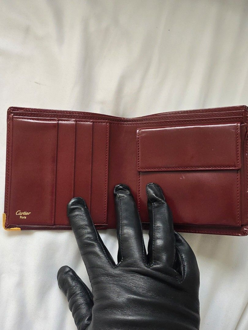Original Cartier Bifold Wallet (Category: Luxury Bags & Wallets) located in Cavite. Submitted by everythingjapan (Listing ID 1407996180, Image 2). Description: Original Cartier bifold wallet see last pics for flaws 4 card slots coin pocket 2 bill compartments no inclusions.